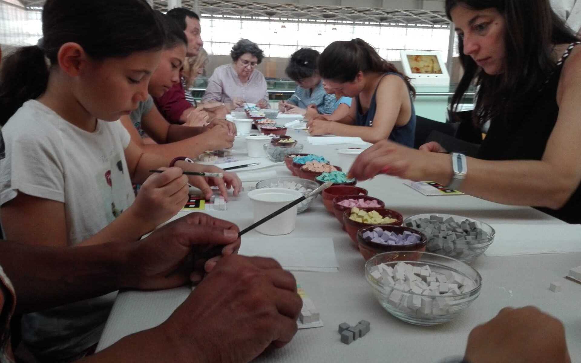 taller de mosaico romano en la villa romana la olmeda
